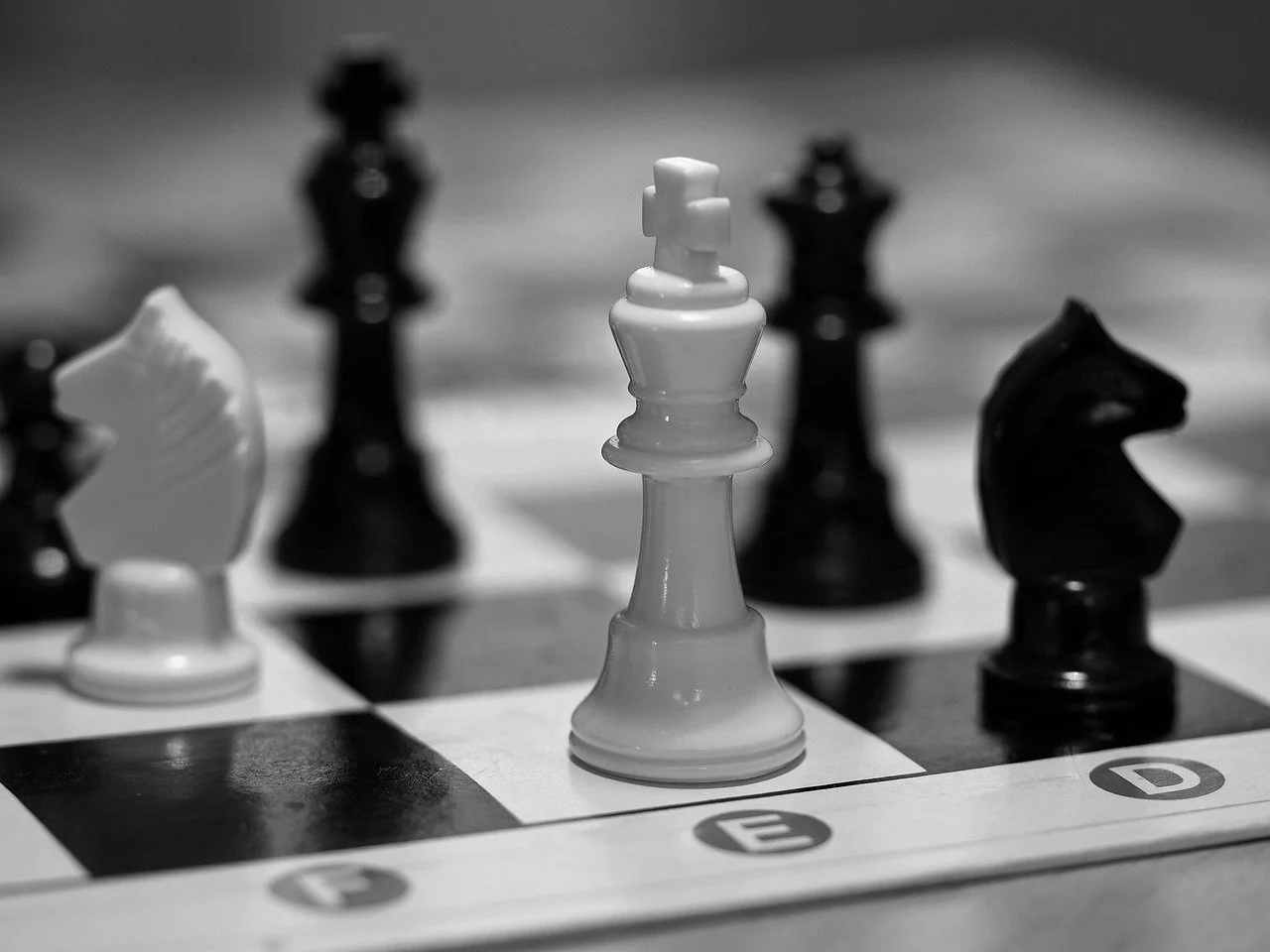 Abstract digital representation of a lead engineer, composed of circuit board motifs and glowing data lines.